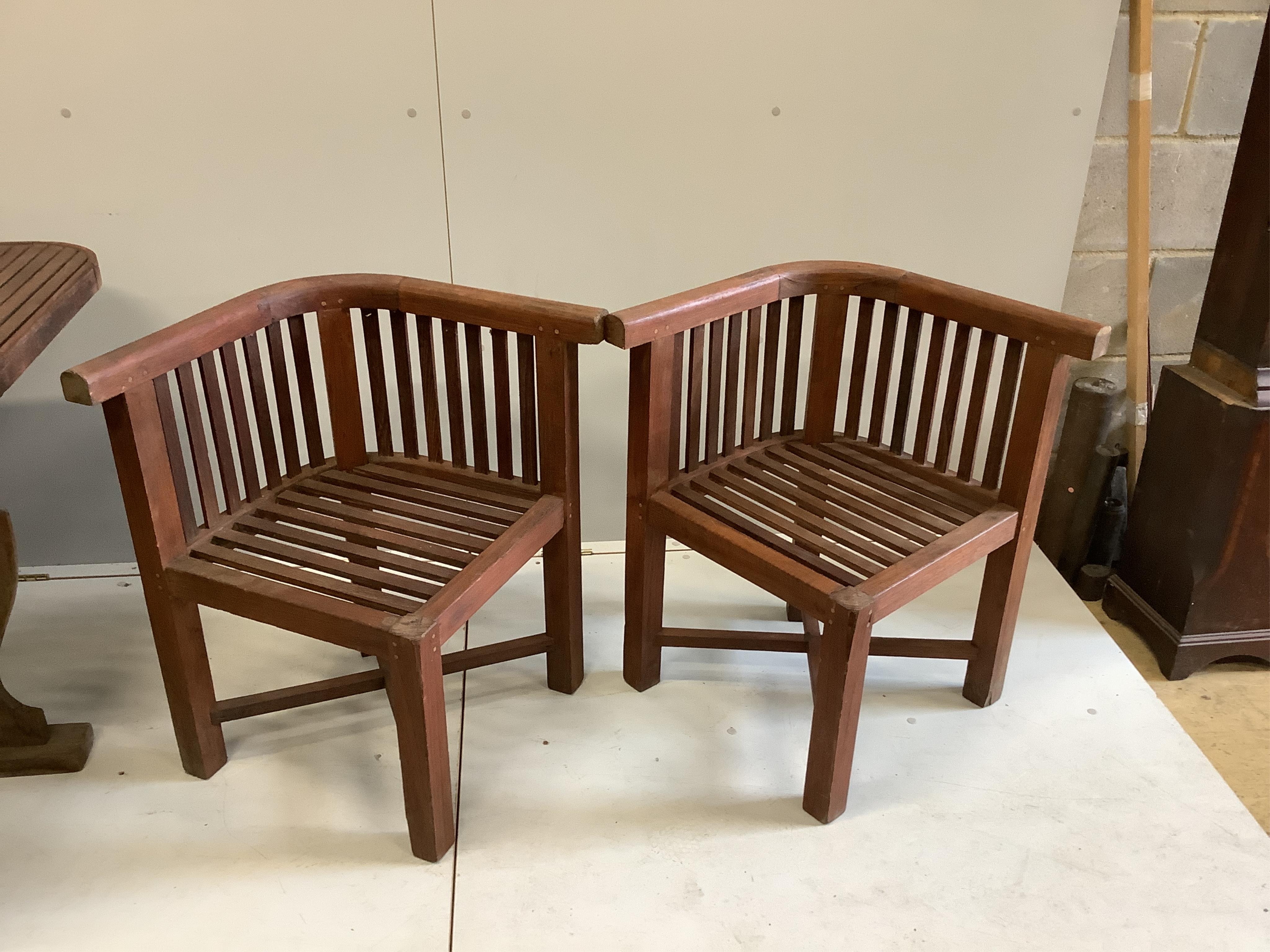 Hughes Bolckow for Heals, a square teak garden table, width 102cm, height 70cm and four chairs